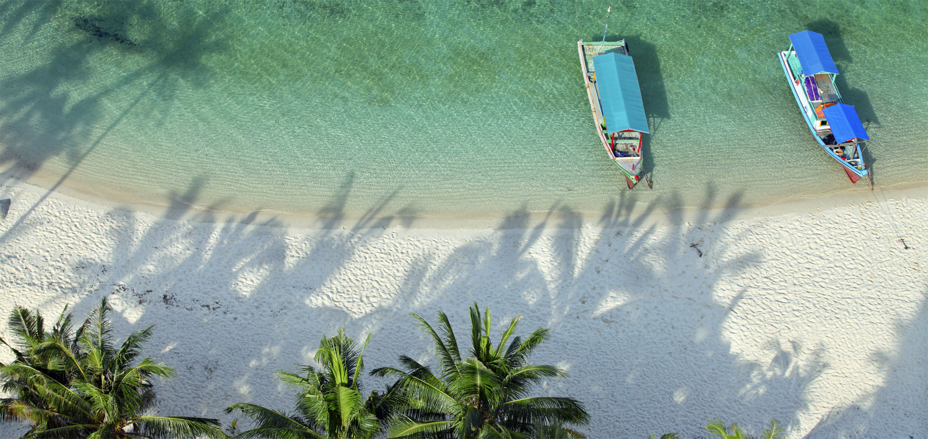 Home 1900x900 Indonesie Sumatra Istock cubadak strand mooi aerial padang